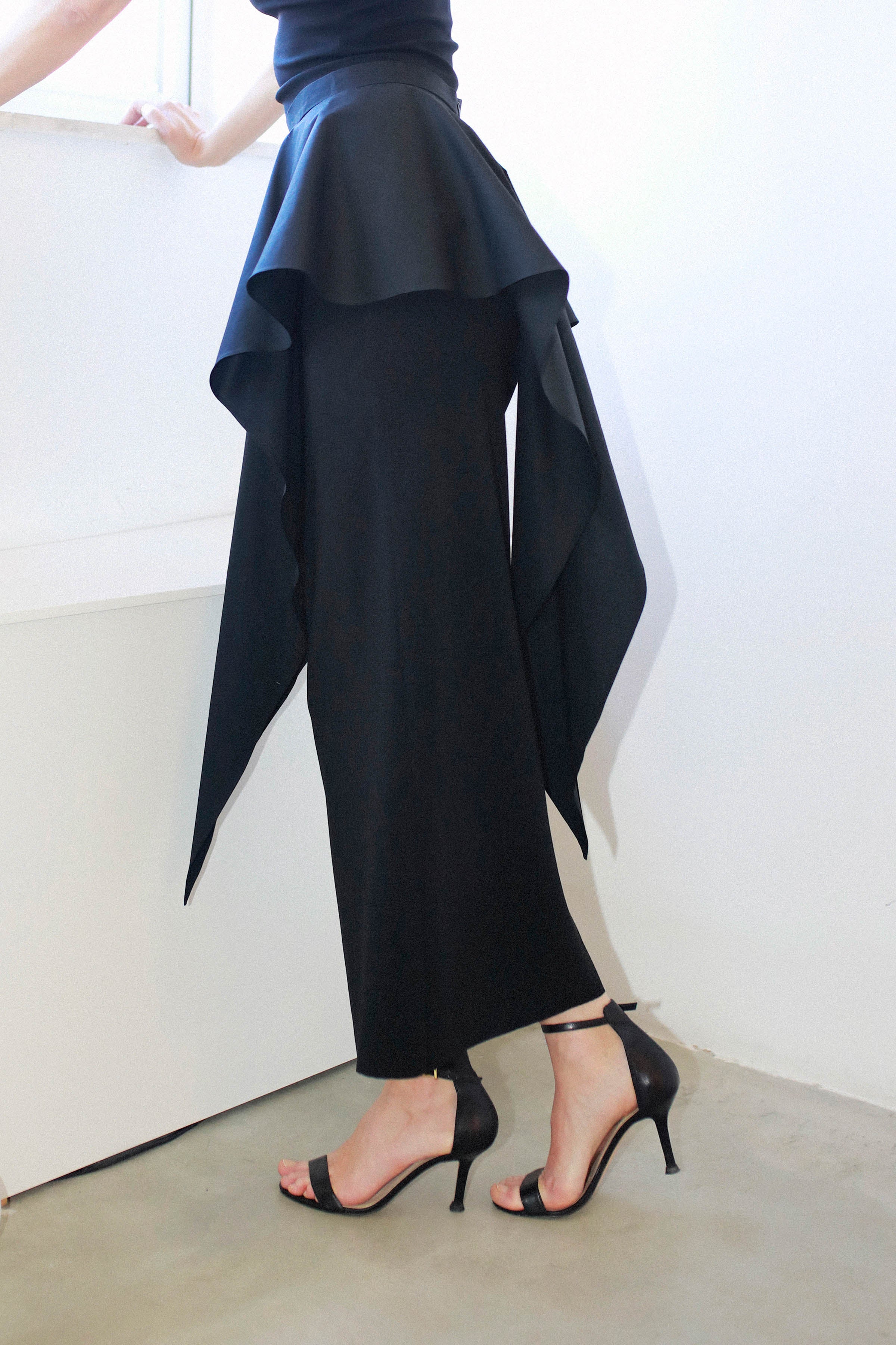 PEPLUM TRIANGLE