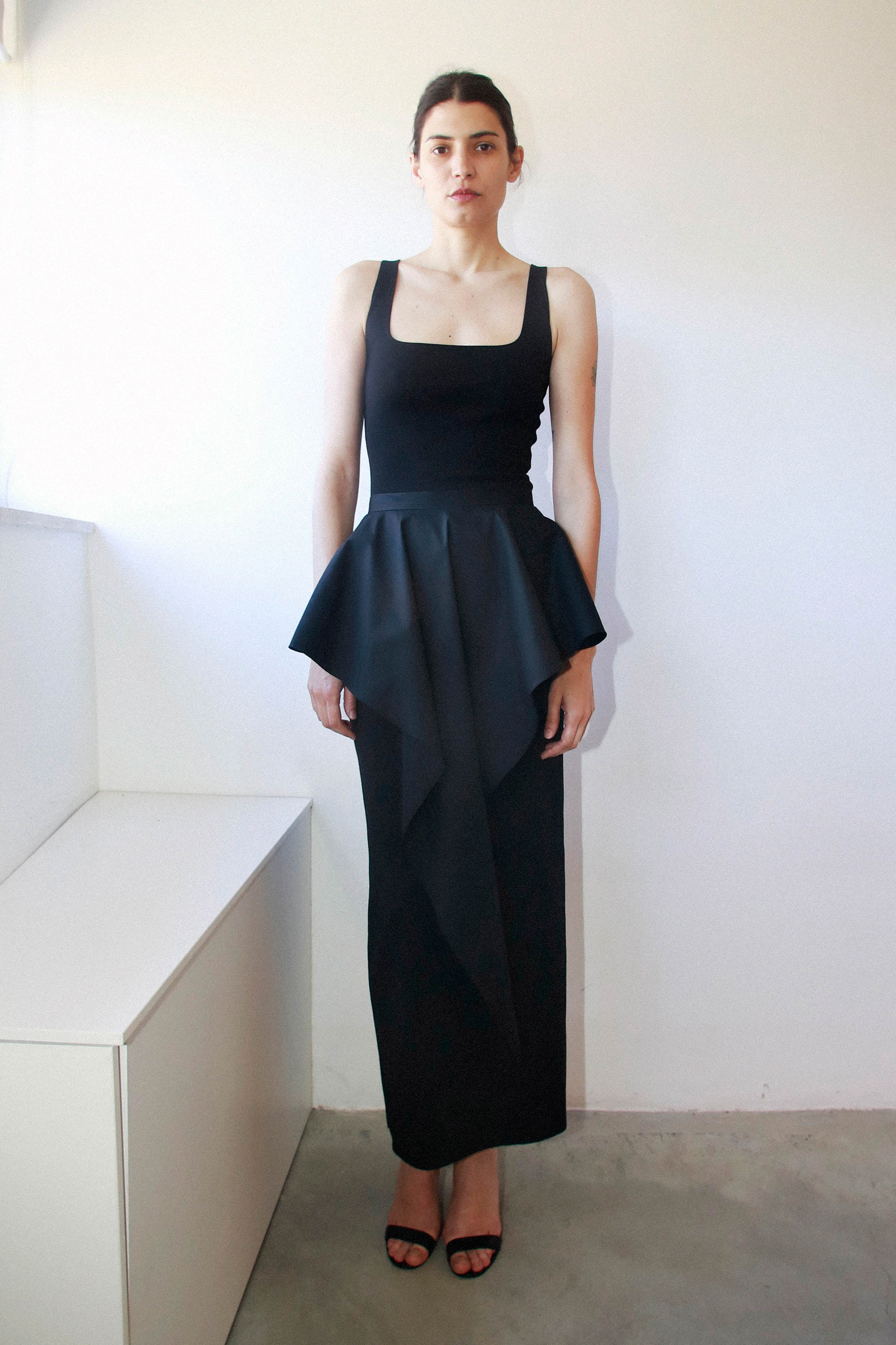 PEPLUM TRIANGLE