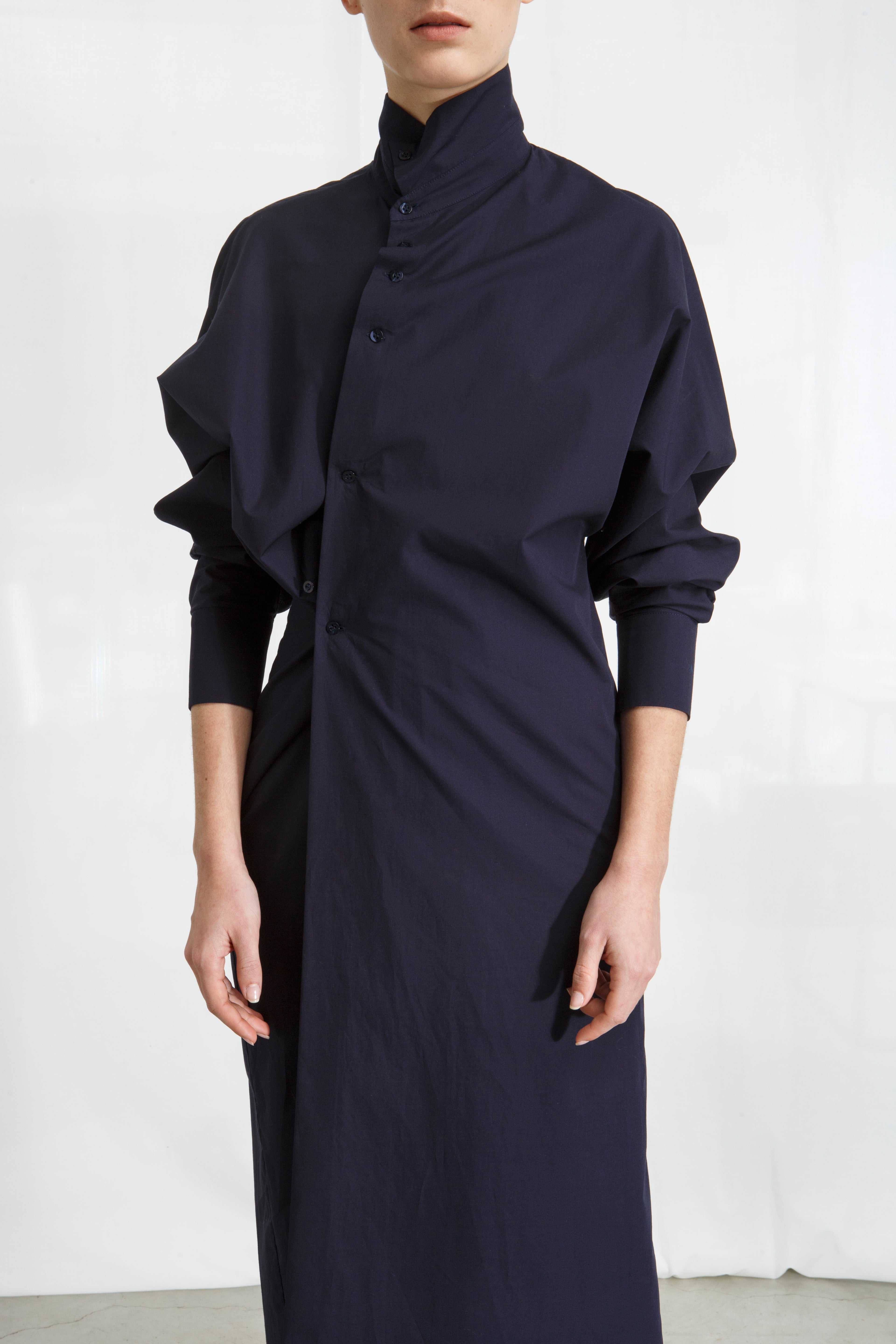 DRESS WITH ASYMMETRIC BUTTONED CLOSURE